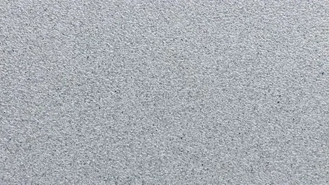 Close up of silver paper, rotation in circle. silver golden paper Turning. Stock Footage 232898696