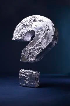 Close-up of silver question mark against black background Stock Illustration