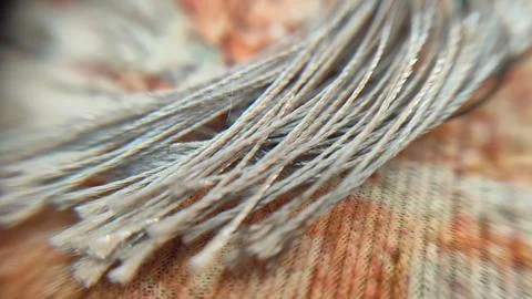 Close up of a silver thread string on a wool Stock Photos
