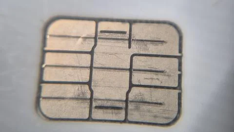 Close-up of a SIM card showing the microchip and its intricate details. This Foto stock