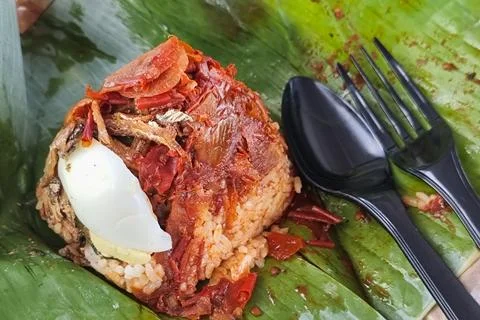 Close-up on simple authentic serving of nasi lemak bungkus, popular rice cooked Stock Photos