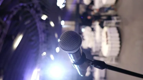 Close-up of a singer's microphone. Vertical video. 4k Stock Footage 230169551