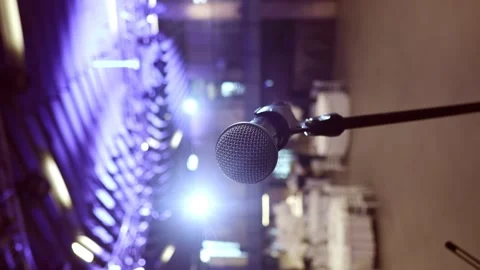 Close-up of a singer's microphone. Vertical video. 4k Stock Footage 230169816