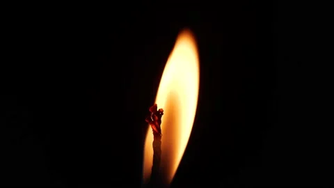 Close-up Single Candle Flame Isolated on Black Background Stock Footage 137896865