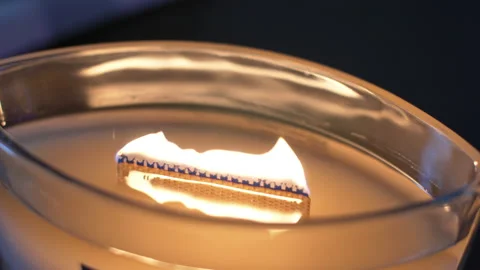 Close-up single candle flame isolated on black background 動画素材 146528095