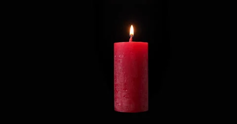 Close-up Single Red Candle Flame Isolated on Black Background. Candlelight Video stock 142752671