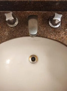 Close up of a sink seen from above Stock Photos