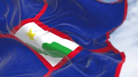 Close-up of Sint Eustatius flag waving in the wind on a clear day Stock-Footage 297393532