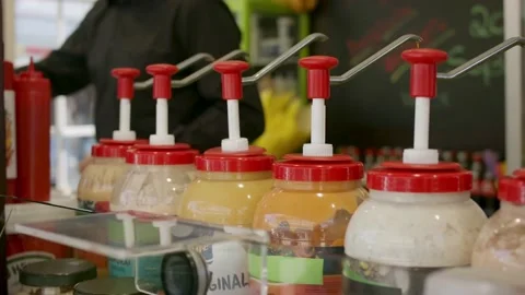 Close-up six bottles where you put-ketschup in Stock Footage 203891487