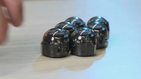 Close up of a six ozobot, mini robots for the next generation of creators. Stock Footage 151476528