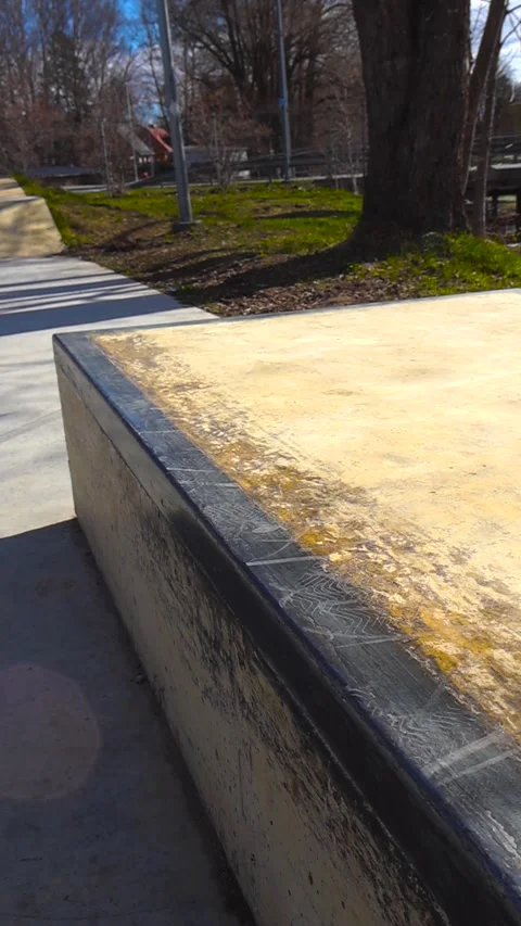 Close up of a skatepark grind box ledge with wax and scratch marks Stock Footage 341861894