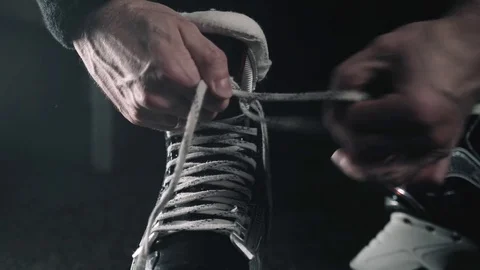 Close-up of skates on player feet during ice hockey before game Stock Footage 78769036