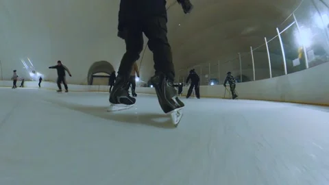 Close-up of skating, a guy skating on ice, a man skating in an indoor ice rink Stock Footage 237179502