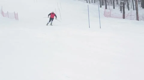 Close-up skier skiing downhill in forest 스톡 동영상 59712073