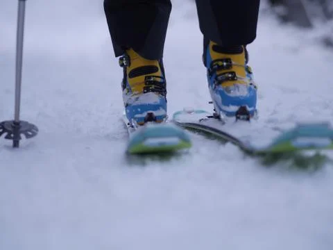 Close-up of skier walking on snow Stock Photos