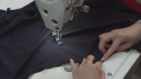 Close-up of Skilled Hands of Tailors and Sewing Machines in Vietnam, Asia Video stock 247416485