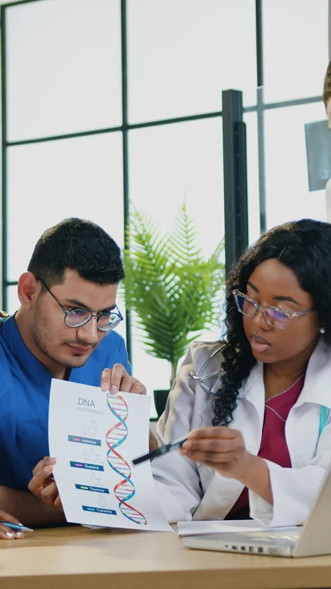 Close up of skilled professional caring mixed race medical workers which discuss Stock Footage 330494111