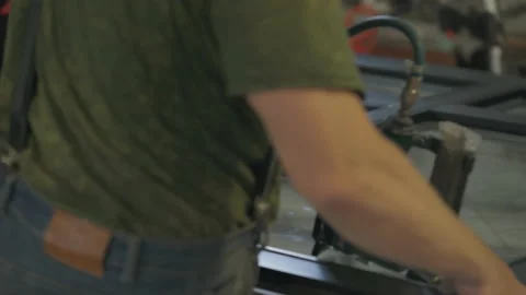 Close Up Of Skilled Worker Using Carpentry Instrument To Attach Glass To Window Stock Footage 220772751