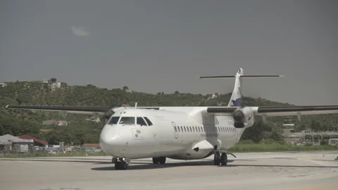 Close Up Sky Express ATR 72 Domestic Passenger Airplane Taxi, Skiathos Stock Footage 198598839