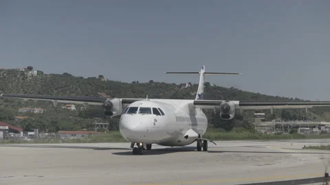 Close Up Sky Express ATR 72 Domestic Passenger Airplane Taxi, Skiathos Airport Stock Footage 198883892