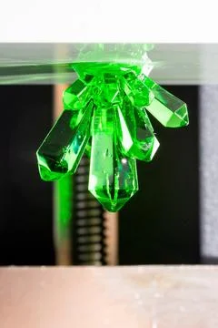Close-up of SLA technology 3D printer. Resin crystal product printed on 3D Stock Photos