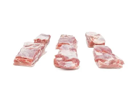 A close up of a slab of meat with a white background Stock Photos
