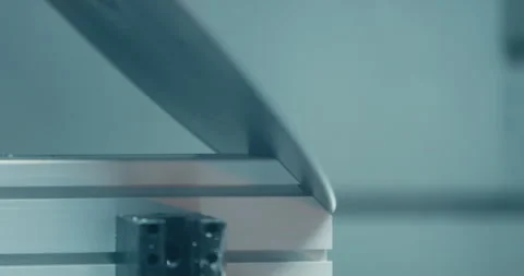 Close up of sleek curved metal component of industrial robotic system Video stock 329681902