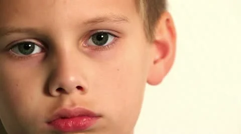 Close up of sleepy child's face - offset onto one side of screen Stock Footage