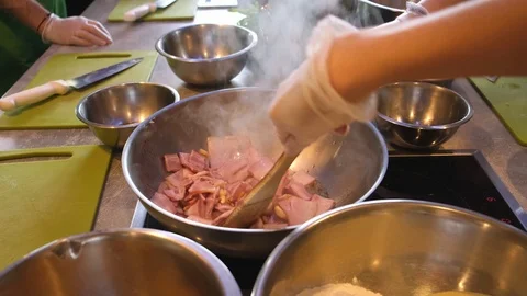 Close up of a slice of bacon fired in a cast-iron pan. Cook frying tiny slices 스톡 동영상 114007078