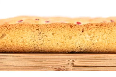 Close-up of a slice of a berry pie on a cutting board. Stock Photos