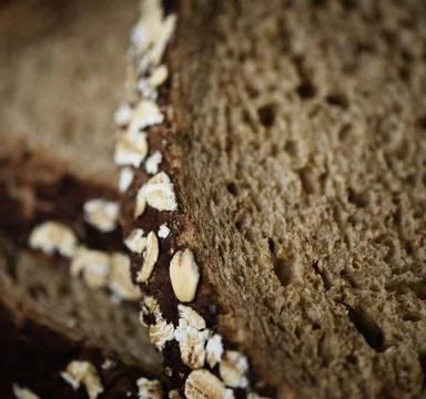 Close up of a slice of brown bread Stock Photos