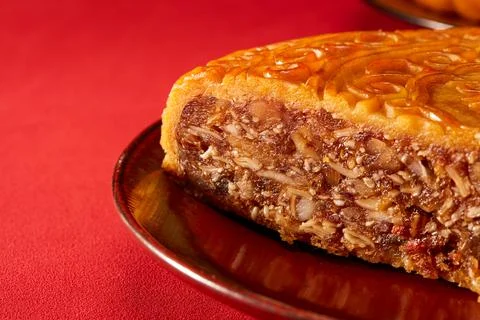 A close-up of a slice of Cantonese traditional five-kernel mooncake Foto stock