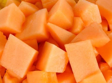 Close up slice of fresh melon Stock Photos
