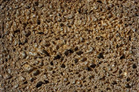 Close up slice porous rye bread texture detailed structure Stock Photos
