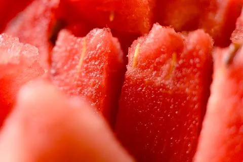 Close up of a slice of ripe red watermelon as a background Stock Photos