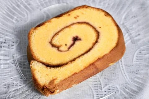 Close up slice of rolled cake Stock Photos