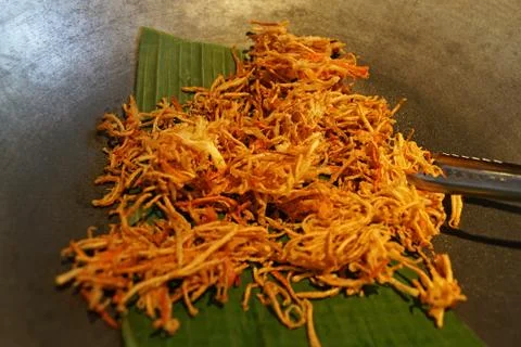 Close up sliced, battered and deep fried papaya noodles Stock Photos