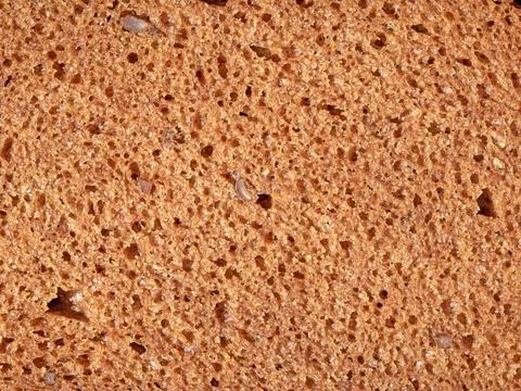 Close-up of sliced bread texture top view, freshly baked wheat loaf surface Stock Photos