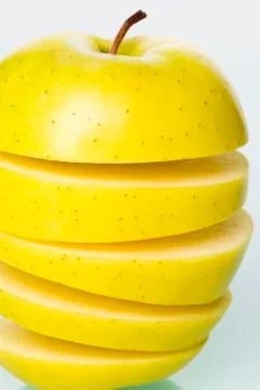 Close up of sliced green apple. Stock Photos