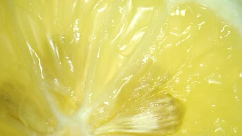Close up sliced lemon spinning 库存影片 284889577