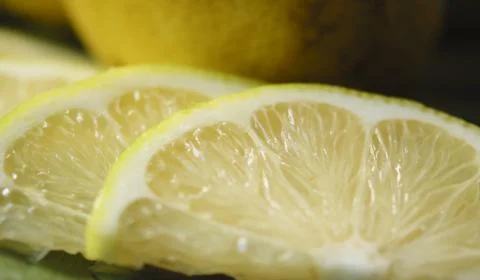 A close-up of sliced lemons Stock Photos