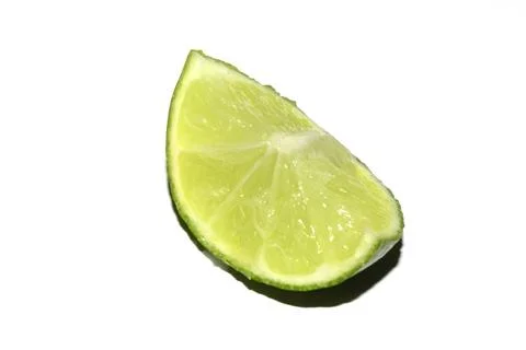 Close Up Of Sliced Lime on White Background Stock Photos