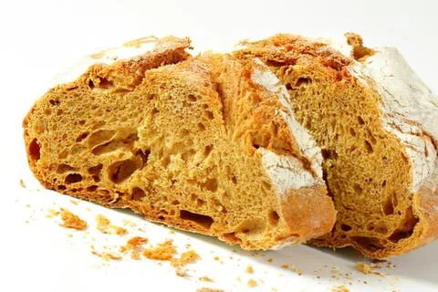 Close up of sliced rustic bread on foil Stock Photos