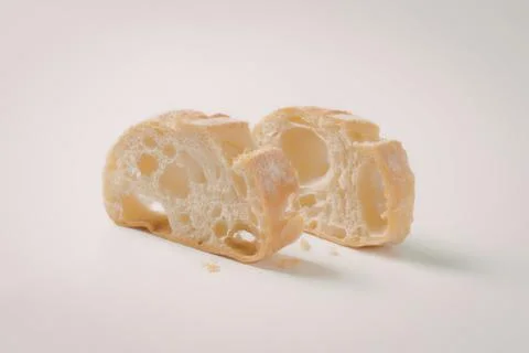 Close-up of sliced rustic bread with holes Stock Photos