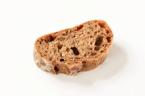 Close-up of sliced rustic bread with holes Stock Photos