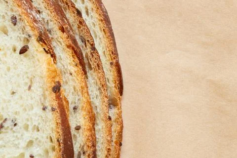 A close-up of sliced seeded bread. Freshly baked, the crisp crust and spongy  Stock-Fotos
