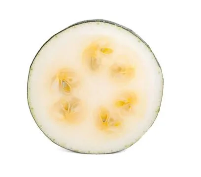 Close-up of a sliced yellow melon on white background Stock Photos
