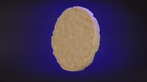 Close up slices of orange on a black background with rotating movement. Stock Footage 303070450