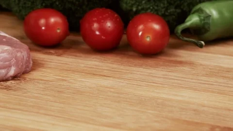 Close-up slices of raw meat and vegetables. Stock Footage 83998841