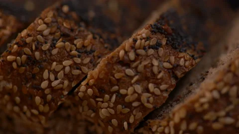 Close Up Slices of Whole Wheat Bread with Seeds Stock-Footage 130204537
